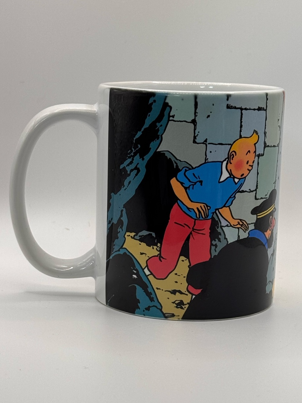 The Adventures of Tin Tin “Prisoners of the Sun” Graphic Coffee Mug.